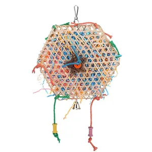 Hexagonal bamboo woven parrot chewing toy with colorful paper shreds and bell detail