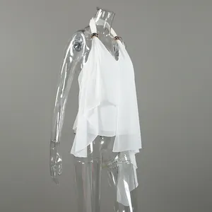 Side view of white elegant halter chiffon vest showing asymmetrical hem and golden metal rings