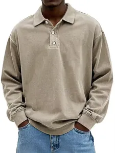 Close-up of mens vintage washed long sleeve polo shirt with buttoned lapel collar