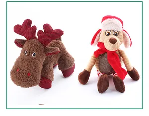 Detailed view of two festive Christmas plush dog toys featuring a reindeer and a dog with a scarf