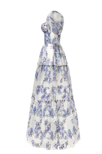 Side view detail of white off-the-shoulder organza maxi dress with blue floral print