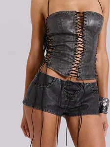 Detailed view of vintage washed PU leather corset set with intricate lace-up detailing