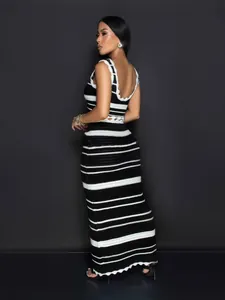 Elegant black and white striped knit two-piece set with tank top and maxi skirt