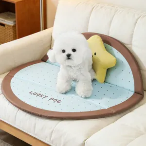 Cozy waterproof pet mat with "Lucky Dog" print featuring a white fluffy dog on a sofa.