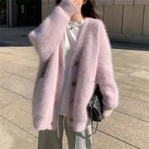 Detail of soft purple fuzzy imitation mink fur cardigan with textured knit surface