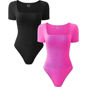 Detailed view of ribbed texture on black and pink square neck sports bodysuits