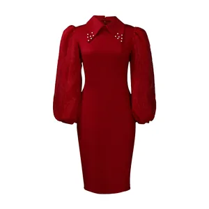 Detail view of a red bodycon pencil dress with pearl collar and sheer puff sleeves.