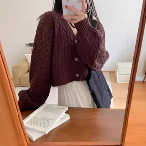 Women's thickened loose cable knit short cardigan sweater for autumn and winter wear.