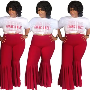 Stylish high-waist flare pants featuring a bold tiered ruffle hem and slim fit design