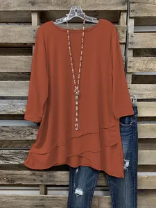 Casual oranje dames T-shirt met onregelmatige gelaagde zoom en driekwart mouwen