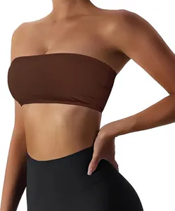 Detailed view of women's solid brown strapless tube top, comfortable sports bandeau bra.