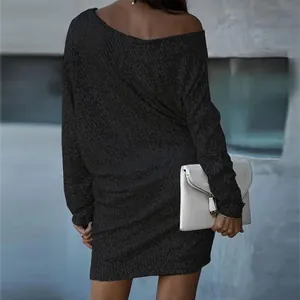 Back view of a black sequined off-shoulder mini dress with elegant texture details.
