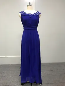 Detailed view of royal blue chiffon evening gown with elegant lace trim on mannequin.