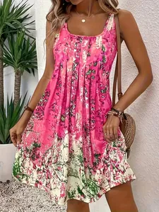 Vestito estivo da spiaggia con stampa floreale rosa vivace e vestibilità morbida