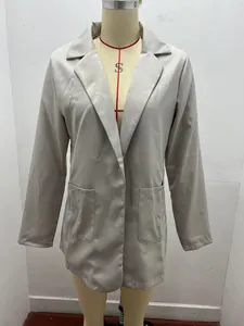 Front view of a minimalist slim-fit light grey blazer featuring a notched lapel