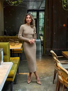 Elegant beige long sleeve ribbed knit midi dress with round neck for autumn fashion