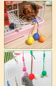 Cats playing with colorful hanging sisal ball toys attached to a pet cage for exercise