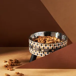 Detail shot of the checkered pattern on an elevated stainless steel pet food bowl
