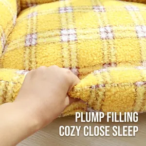 Thick yellow checkered fleece cat sofa bed showing ultra-soft plush cushion texture