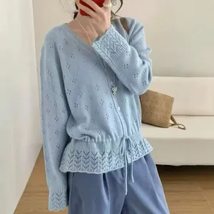 Elegant light blue hollow-out knit cardigan with drawstring waist and V-neck