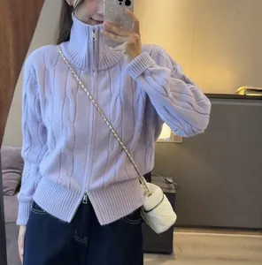 Lavender cable-knit cardigan featuring a double zipper and high collar design detail