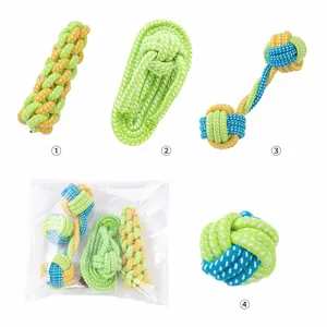 Detailed view of a 4-piece colorful braided rope dog chew toy set in packaging.