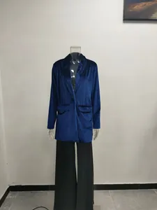 Front view of women's blue gold velvet coat with notched lapels on a clear mannequin