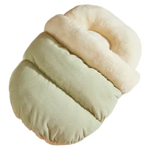 Warm light green corduroy pet sofa bed with soft cream plush interior for cats and dogs