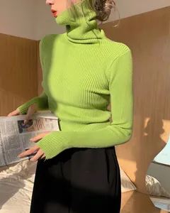 Close-up of a vibrant neon green ribbed turtleneck sweater for women with a slim fit