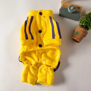 Yellow pet tracksuit with purple stripes and black buttons, soft fleece fabric detail.