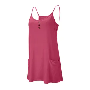 Detailed view of women's pink V-neck sleeveless dress with buttons and pockets