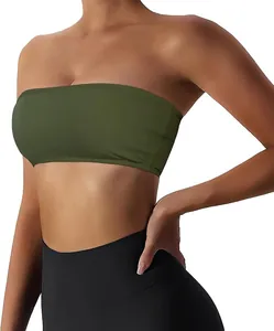 Detailed side view of a stylish olive green strapless bandeau sports bra worn by a model