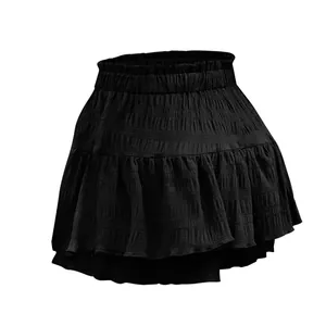 Detailed view of a fashionable women's black ruffled mini skort with elastic waist