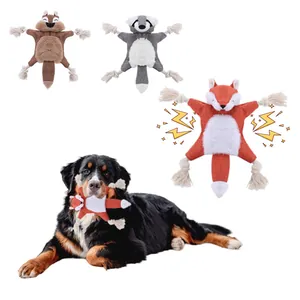 Plush squeaky dog toys in fox, squirrel, and raccoon shapes with rope knot limbs.