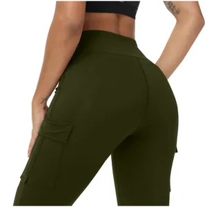 Close-up detail of high-waisted yoga leggings with functional cargo pockets in army green