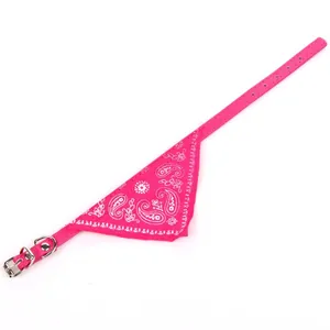 Close-up detail of a vibrant hot pink pet PU collar with paisley printed bandana scarf
