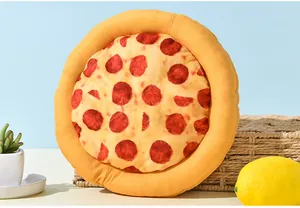 Detail of pizza shaped plush dog toy with squeaky sound and pepperoni print