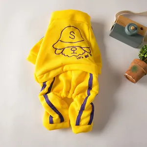 Detailed view of yellow pet sports hoodie set with purple stripes and cute embroidery