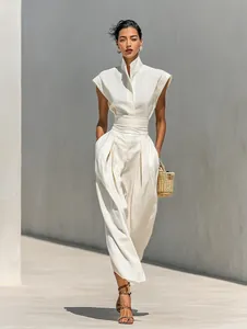 Full detail view of an elegant white high-neck linen set with wide-leg trousers.