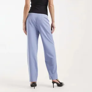Back view of professional women's high-waisted light blue straight-leg commuter trousers