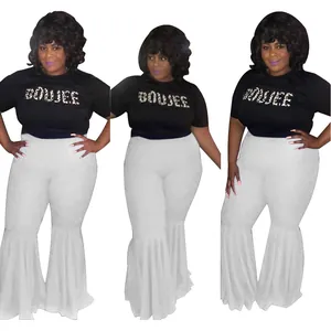 White slim fit flare leg trousers with dramatic ruffled hem for party wear