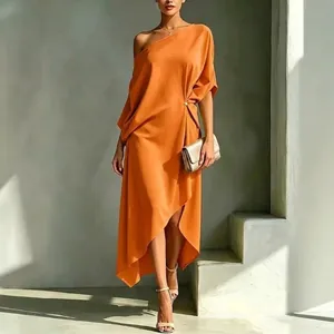 Elegant minimalist orange one-shoulder sleeveless dress with a draped wrap design