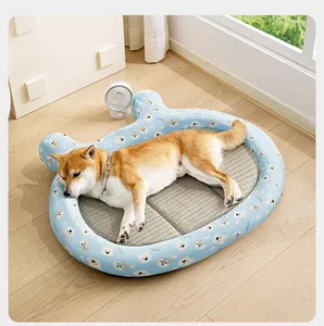 Cozy summer pet cooling mat bed with blue cartoon dog patterns on wooden floor