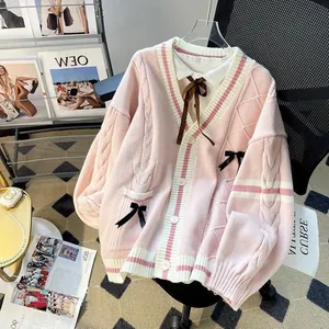 Cardigan en maille rose oversize avec nœuds 3D noirs et col en V pour femmes