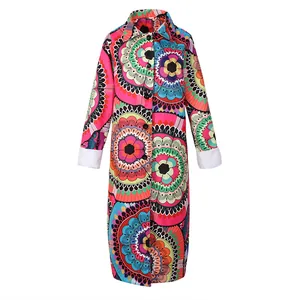 Front view of vibrant digital print trench coat featuring kaleidoscopic floral patterns.
