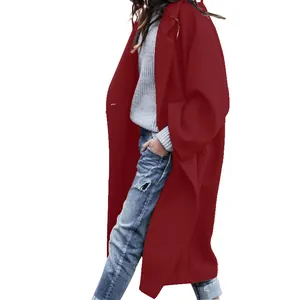 Side view of a stylish long red wool coat featuring an oversized collar and loose fit