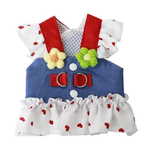 Cute denim pet harness dress featuring red heart patterns and knitted flower decorations
