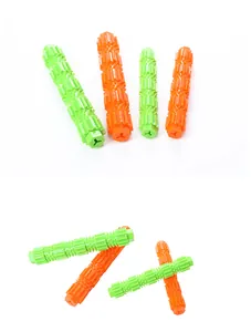 Close-up detail of durable TPR dog chew sticks with textured ridges for pet dental health.