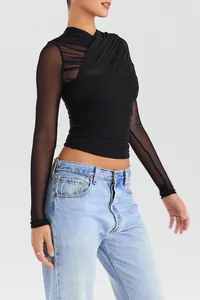 Detail view of black sheer mesh long sleeve top with ruched design