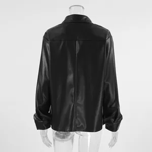 Rear view of a minimalist black PU leather jacket showing detailed faux leather texture